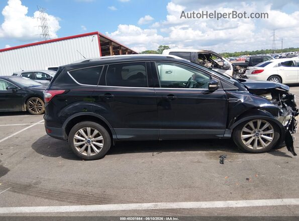 1FMCU0J96HUD75213 2017 FORD ESCAPE Black Rear interior view
