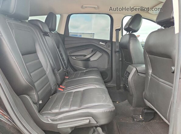 1FMCU0J97HUD57738 2017 FORD ESCAPE Black Widok wnętrza z tyłu