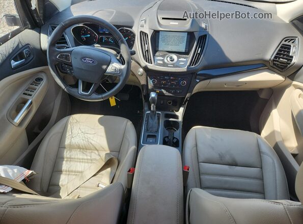 1FMCU0JD0HUE29416 2017 FORD ESCAPE Gold Vista del salpicadero