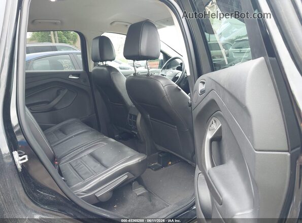 1FMCU0JD7HUD65083 2017 FORD ESCAPE Black Vista de la etiqueta del VIN