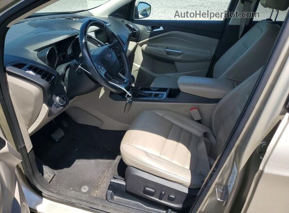 1FMCU0JDXHUB49633 2017 FORD ESCAPE Золотой Вид салона спереди