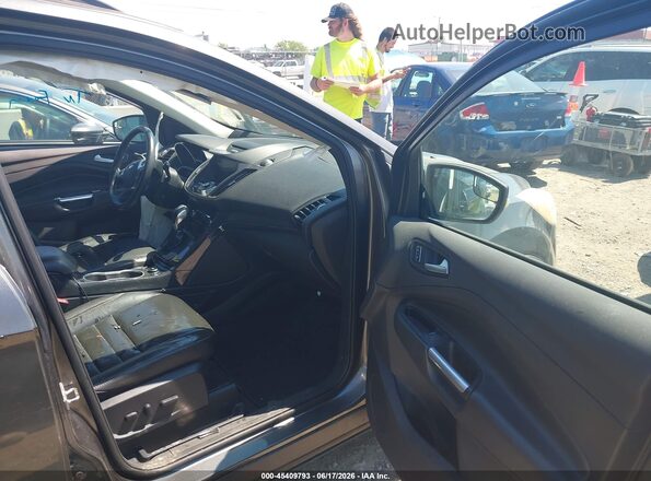 1FMCU0JX4GUA04032 2016 FORD ESCAPE Серый Вид салона спереди