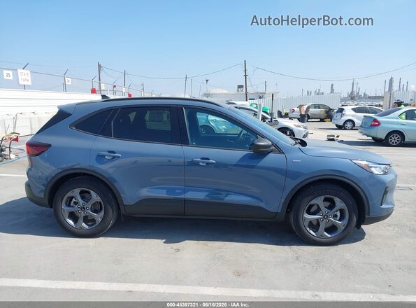 1FMCU0MN0SUA89633 2025 FORD ESCAPE Синий Вид задней части салона
