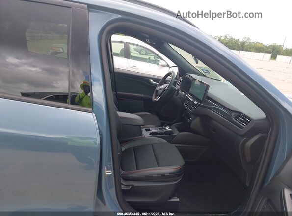 1FMCU0MN7TUA20231 2026 FORD ESCAPE Blue Вид салону спереду