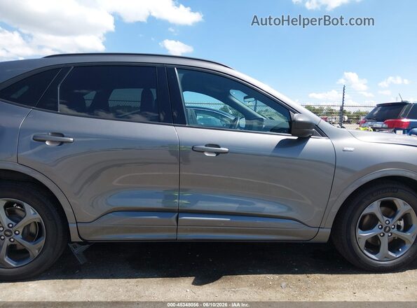 1FMCU0MN8PUB18609 2023 FORD ESCAPE Серый Вид задней части салона