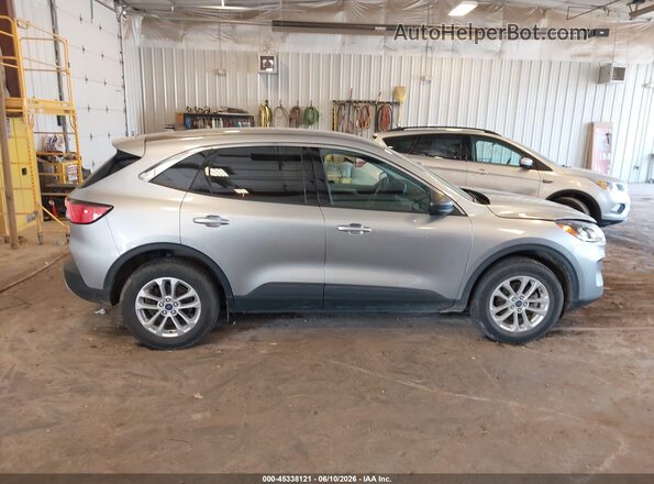 1FMCU9G66NUA78696 2022 FORD ESCAPE Серебряный Вид задней части салона