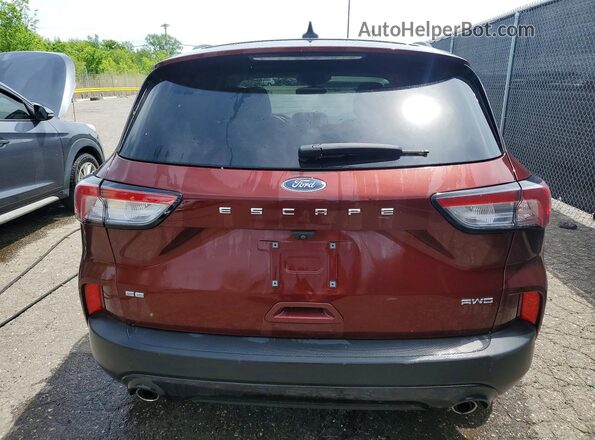 1FMCU9G67MUB00980 2021 FORD ESCAPE Burgundy Rear view