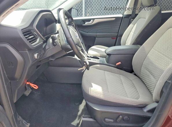 1FMCU9G67MUB00980 2021 FORD ESCAPE Burgundy Front interior view