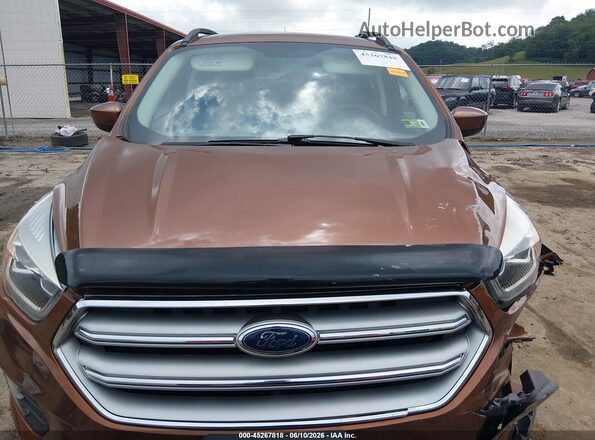 1FMCU9G91HUD30367 2017 FORD ESCAPE Brown Rear interior view
