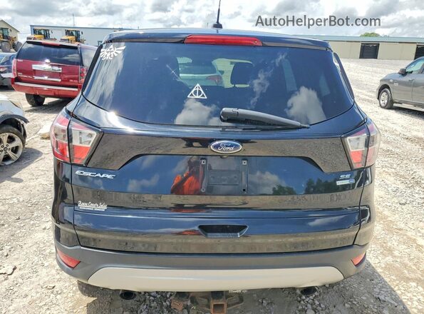 1FMCU9G92HUB76672 2017 FORD ESCAPE Черный Вид сзади