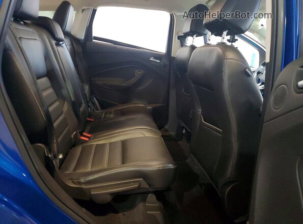 1FMCU9G94HUE34514 2017 FORD ESCAPE Blue Rear interior view
