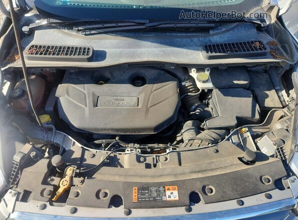 1FMCU9G95HUA23218 2017 FORD ESCAPE Silver Rear interior view