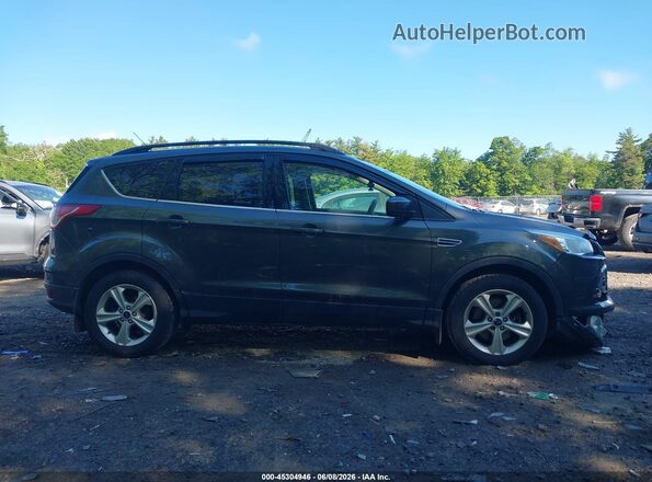 1FMCU9G99GUB42291 2016 FORD ESCAPE Gray 