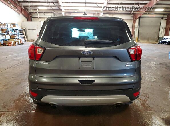 1FMCU9GD0KUB85740 2019 FORD ESCAPE Gray Rear view