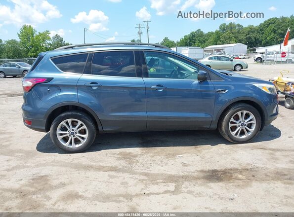 1FMCU9GD1JUB05604 2018 FORD ESCAPE Blue უკანა სალონის ხედი