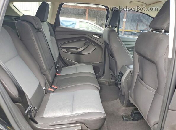 1FMCU9GD2JUB92090 2018 FORD ESCAPE Black Widok wnętrza z tyłu