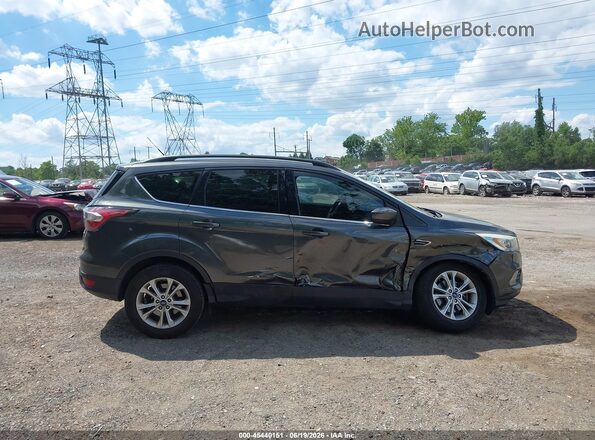 1FMCU9GD3HUB03668 2017 FORD ESCAPE Gray Widok wnętrza z tyłu