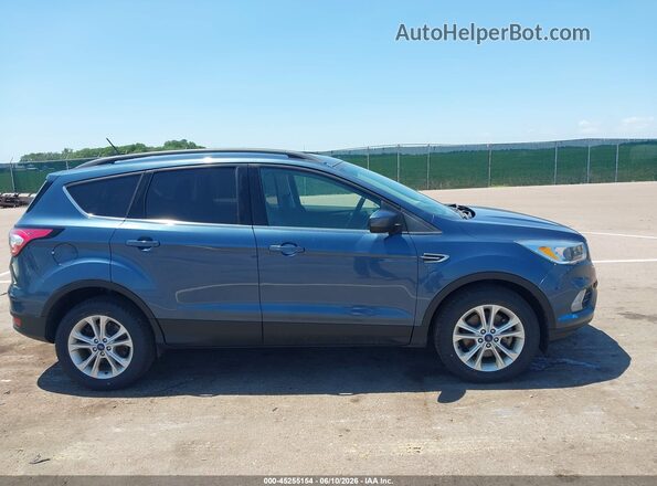 1FMCU9GD3JUB13753 2018 FORD ESCAPE Blue Widok wnętrza z tyłu