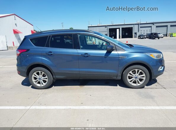 1FMCU9GD5JUA14190 2018 FORD ESCAPE Синий Вид задней части салона