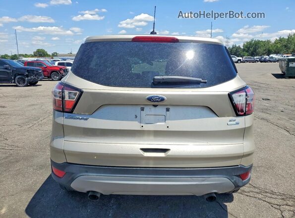 1FMCU9GD6HUC79341 2017 FORD ESCAPE Gold Widok z tyłu