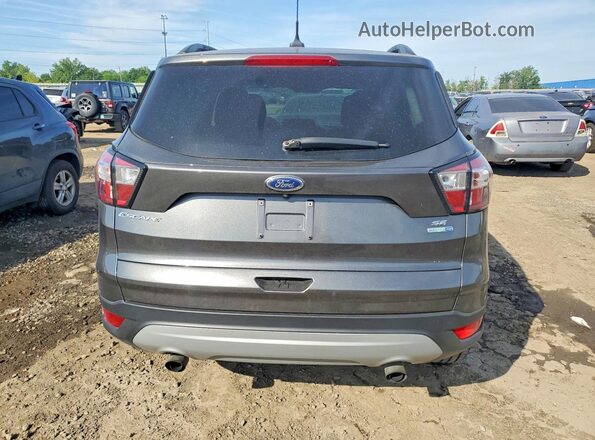 1FMCU9GD6JUC58754 2018 FORD ESCAPE Gray Rear view