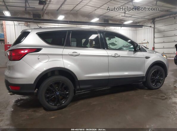 1FMCU9GD6KUA64260 2019 FORD ESCAPE Серебряный Вид задней части салона