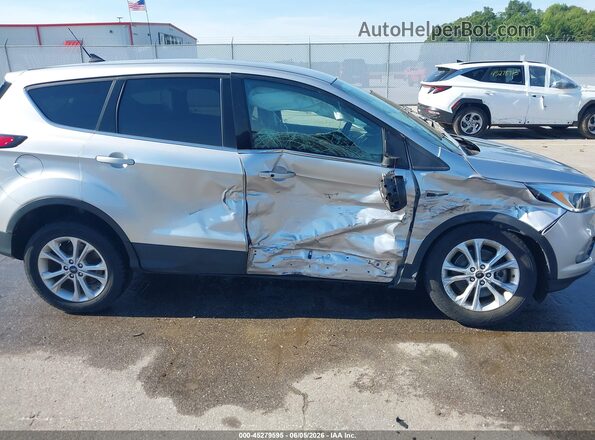 1FMCU9GD7KUC05871 2019 FORD ESCAPE Silver Rear interior view