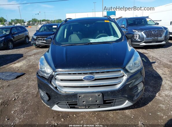 1FMCU9GD8HUC85450 2017 FORD ESCAPE Черный Вид задней части салона