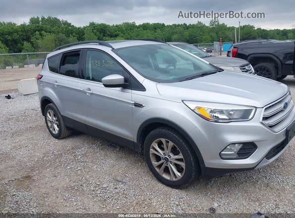 1FMCU9GD9JUA83075 2018 FORD ESCAPE Silver Widok wnętrza z tyłu