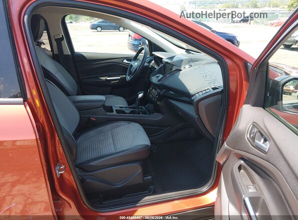 1FMCU9GDXKUB07028 2019 FORD ESCAPE Orange Front interior view