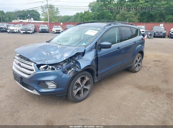 1FMCU9HD1JUB93794 2018 FORD ESCAPE Light Blue Вид спереди