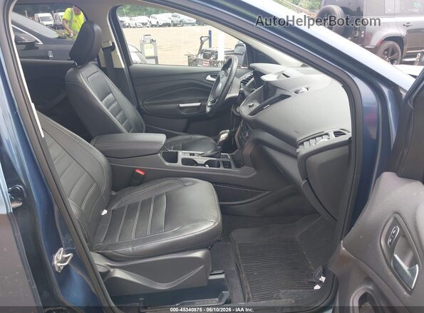 1FMCU9HD1JUB93794 2018 FORD ESCAPE Light Blue Вид салона спереди