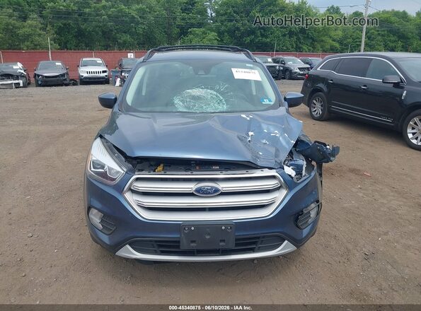 1FMCU9HD1JUB93794 2018 FORD ESCAPE Light Blue Вид щитка приборов