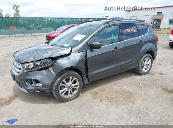1FMCU9HD1KUB22872 2019 FORD ESCAPE Gray Vista tres cuartos delantera izquierda