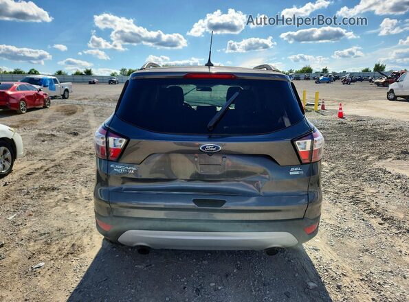 1FMCU9HD2JUC55106 2018 FORD ESCAPE Gray Rear view
