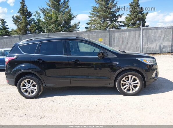 1FMCU9HD8JUC04578 2018 FORD ESCAPE Black Widok wnętrza z tyłu