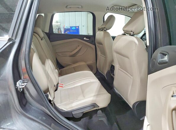 1FMCU9J90JUC25673 2018 FORD ESCAPE Серый Вид задней части салона