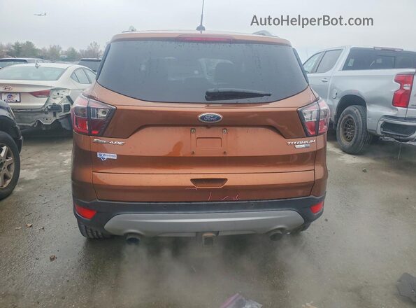 1FMCU9J93HUB53930 2017 FORD ESCAPE Brown უკანა ხედი
