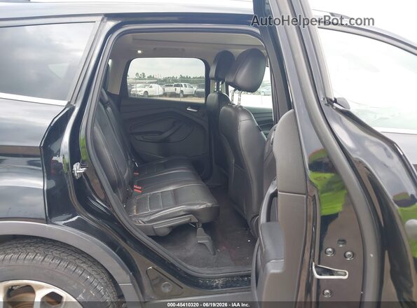 1FMCU9J94GUB59847 2016 FORD ESCAPE Black Vista de la etiqueta del VIN