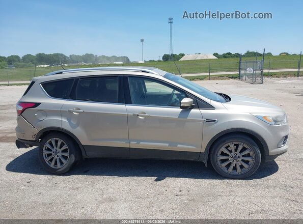1FMCU9J95HUE66266 2017 FORD ESCAPE Beige Widok wnętrza z tyłu