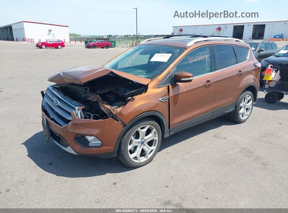 1FMCU9J97HUE23841 2017 FORD ESCAPE Оранжевый Передняя левая четверть