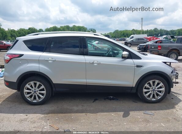 1FMCU9J98HUB06568 2017 FORD ESCAPE White Widok wnętrza z tyłu