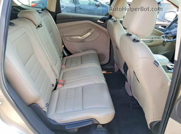 1FMCU9JD0HUA18134 2017 FORD ESCAPE Beige Սալոնի հետևի տեսք