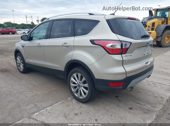 1FMCU9JD2HUE22567 2017 FORD ESCAPE Золотой Задняя левая четверть