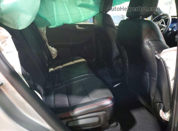 1FMCU9PA8PUB37707 2023 FORD ESCAPE Серебряный Вид задней части салона
