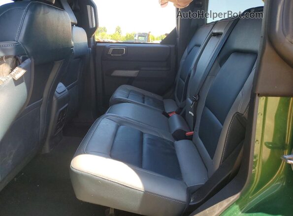 1FMDE5DH0PLC07900 2023 FORD BRONCO Green Vista interior trasera