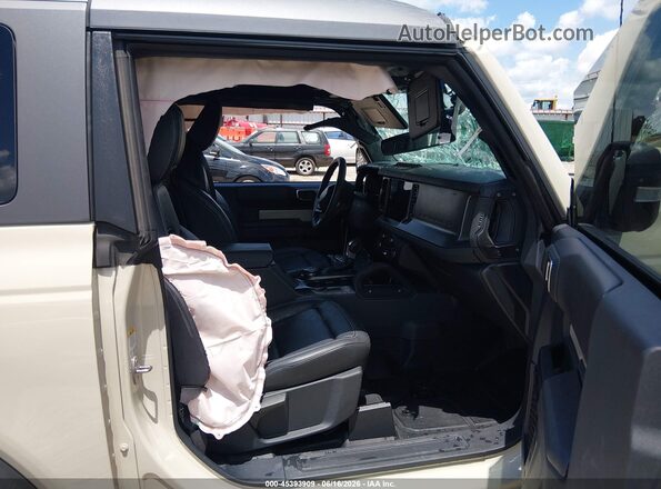 1FMDE9AH5SLA95938 2025 FORD BRONCO Beige Front interior view