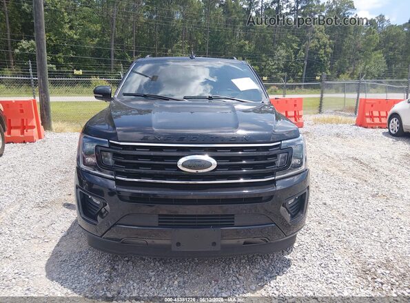 1FMJK1KT0MEA52129 2021 FORD EXPEDITION Black Rear interior view