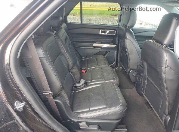 1FMSK7DH0PGB74126 2023 FORD EXPLORER Black Widok tylnych siedzeń