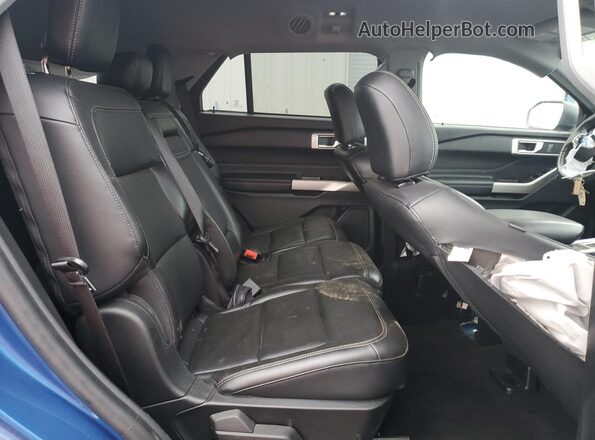 1FMSK7DH4NGB06974 2022 FORD EXPLORER Blue Rear interior view